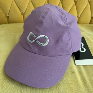 Orignal NWT Dover Saddlery stride hat with horse shoes in lavender grape color